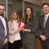Women in Business award winner Joanne Alexander  is congratulated by Marguarita McNally, WiB senior marketing executive . Included are Andrew McMullan, capital works manger and John McVeigh, head of capital works and redevelopment, Mid and East Antrim Council.