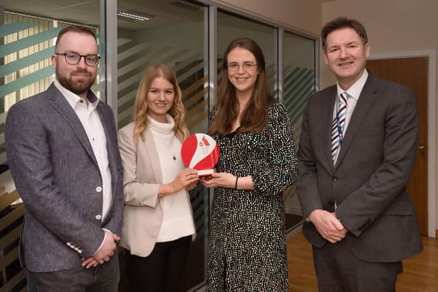 Women in Business award winner Joanne Alexander  is congratulated by Marguarita McNally, WiB senior marketing executive . Included are Andrew McMullan, capital works manger and John McVeigh, head of capital works and redevelopment, Mid and East Antrim Council.