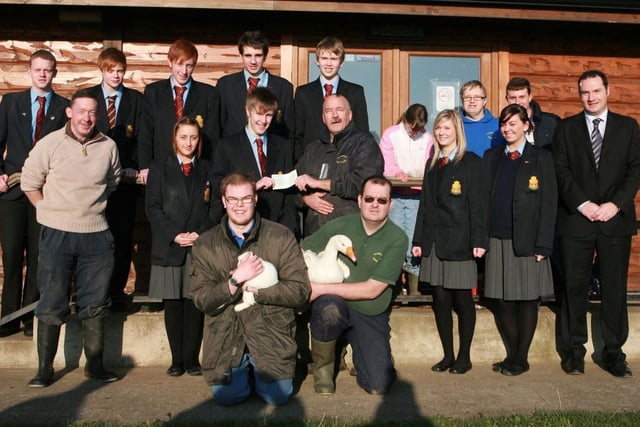 Pupils from Downshire School visit Kilcreggan Urban Farm to hand over a cheque for £100 to help repair enclosures following vandalism shortly before Christmas 2009. CT03-003tc