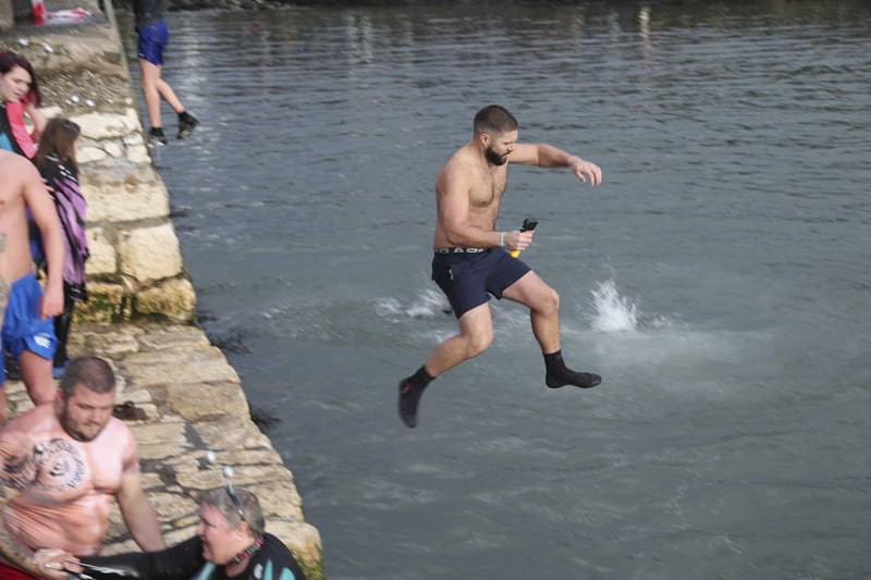 Leaping into 2023 at the annual New Year's Day swim in Carnlough.