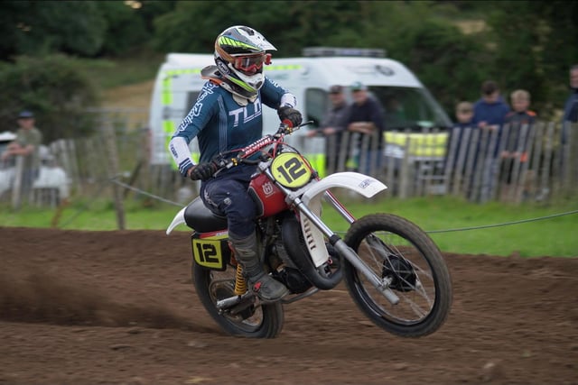 Classic rider & Winner Adrian Lappin wheelies his way out of a bend at the Temple track during last week’s racing