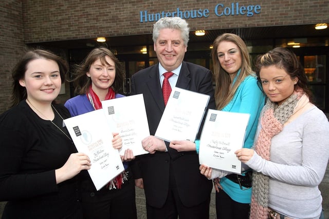Hunterhouse former pupils Joy Shirlow, Emma Carson, Laura Williams and Kelly McDowell receive the Diana Memorial Making A Difference Award from South Belfast MLA Alasdair McDonald in 2007