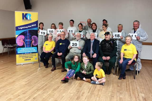 The participants in the Caring Caretaker's Jail and Bail event in memory of Denis McNeill to raise funds for NI Kidney Research. Credit Davy Boyle