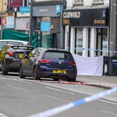 A child has been taken to hospital following a serious road traffic collision in Carrickfergus.  Police closed High Street (above), Castle Street and part of the Marine Highway following the incident.  Photo: Pacemaker Press