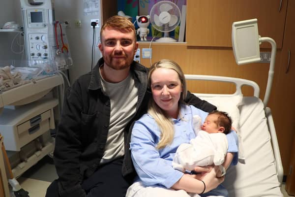 Parents Niamh and Gareth with baby James. Pic credit: SEHSCT
