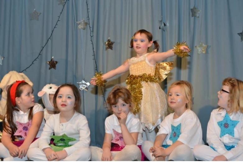 Ellie McCrory as an angel on stage with the cast of the Sunnylands Primary School Nativity play in 2013.