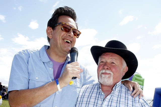 LET'S TALK...Compere Alan Simpson has a chat with Gerald Dallat during the Ford Fair at the Dunluce Centre in 2009.