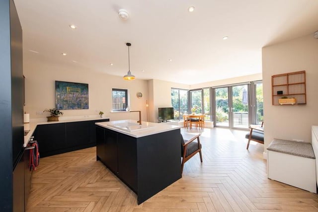 Luxury fitted kitchen with French doors to the rear.