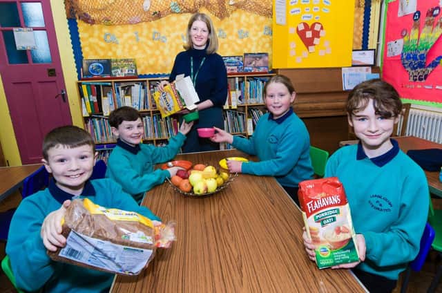 Carnlough Integrated Primary School principal Claire Mulholland with pupils Tomas, Scott, Elsa and Rose.