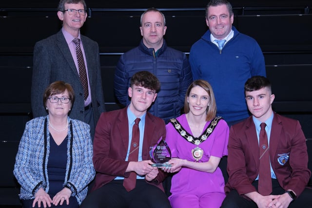 Pictured at the Civic Awards with Chair of the Council, Councillor Córa Corry are Rafferty Cup winners - St Pius X Magherafelt - with nominating councillors Martin Kearney and Christine McFlynn.