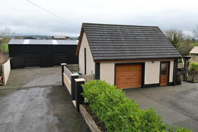 The detached garage with roller shutter door and pedestrian entrance is currently used as an office and benefits from kitchen and WC facilities, heating and electrictricity points. There is storage space upstairs and downstairs.
