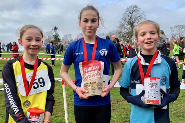 Finishing first place in the girls’ race was Gemma Marsden (centre) a pupil at St Francis Primary School, Lurgan, Co Armagh followed by Emma Rankin, (right) from Maralin Village Primary School, Magheralin in second place and Lucia McMullen (left) from Kings Park Primary School, Lurgan finishing in third place.