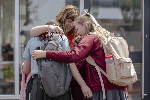 Mrs Martin bids an emotional goodbye to her pupils before she leaves for another teaching post.