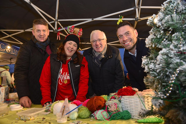 Pictured at the Carryduff Christmas Market are (l-r) Stephen Orr, Fraser Homes; Leeanne Mulhern, Kinder Garden Cooks; Alderman Allan Ewart MBE, Chairman of Lisburn & Castlereagh City Council’s Development Committee and Keith Lamont, Lidl Northern Ireland.