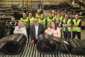 Pictured with the production team at Smiley Monroe, Lisburn, are Roseann Kelly, Chief Executive of The WiB Group; Don Leeson, Chief Executive at the Labour Relations Agency and Jayne Peters, Director of People and Culture at Smiley Monroe. Picture: Brian Thompson