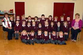 Annahilt Primary School P1 pupils with Mrs Debbie Davidson, right, teacher, and Mrs Mavis Cunningham, classroom assistant in 2012