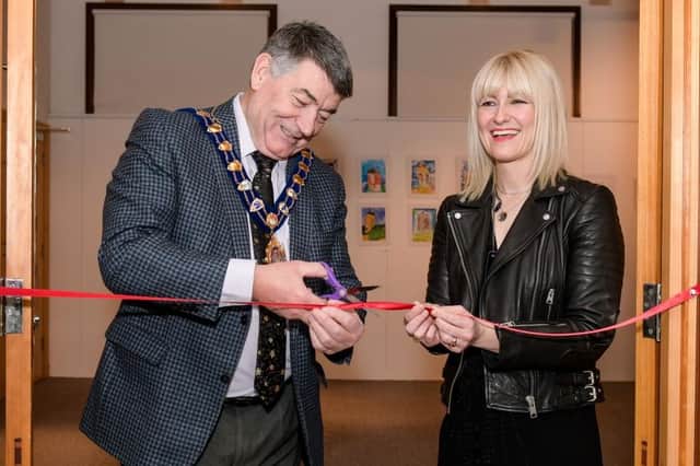 The Mayor, Alderman Noel Williams, and Kim Montgomery, artist/teacher at Roddensvale School, open the exhibition.