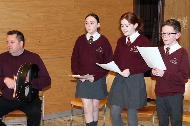 Young singers from Gaelscoil Léim An Mhadaidh perform in Cloonavin during the Irish Language Week celebration.