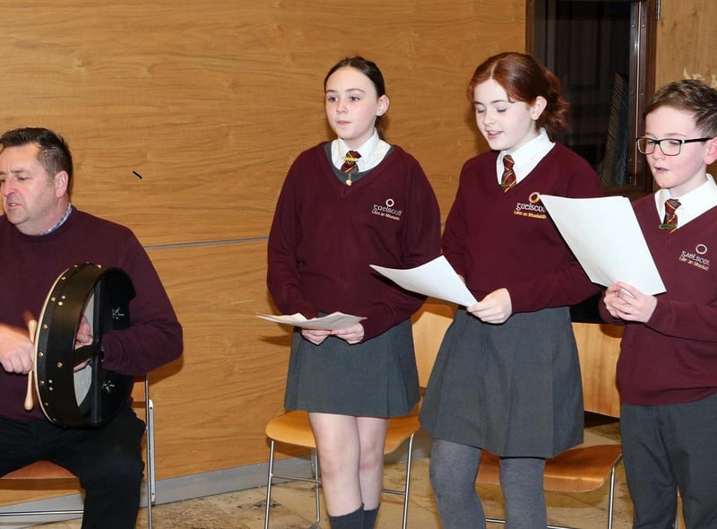 Young singers from Gaelscoil Léim An Mhadaidh perform in Cloonavin during the Irish Language Week celebration.