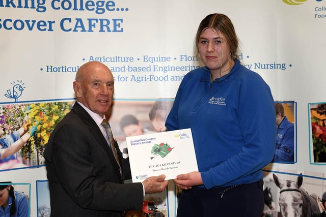 On behalf of the Aga Khan Stud, Dr Dean Harron (ITBA) presents a bursary to Foundation degree in Equine Management student Charlotte Agar (Tullow).