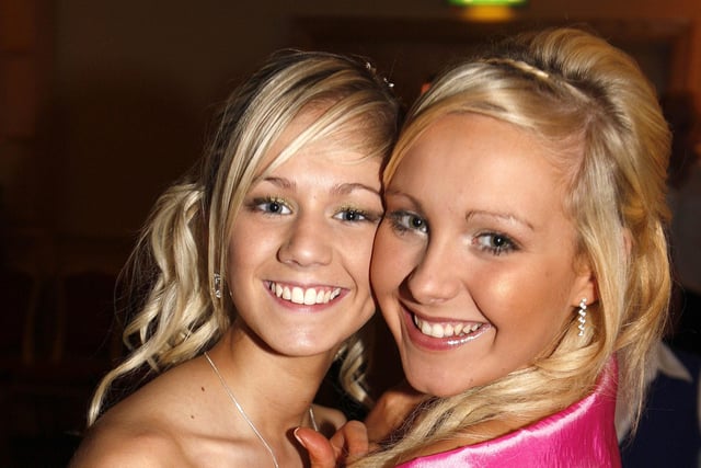 ALL SMILES...Abby and Jessica having fun at the Dunluce School Formal at the Royal Court Hotel in 2009.
