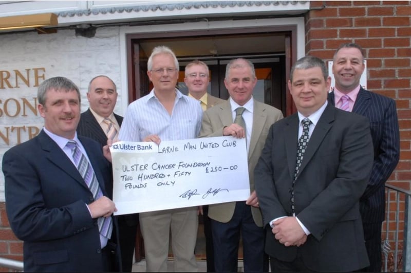 Billy McCluggage and Tom Wilson were both doing a walk over Hadrian's Wall to raise money for the Ulster Cancer Foundation in 2007. They were pictured above receiving a cheque for £250 from committee members of the Larne branch of the Manchester United Supporters' Club: Leslie Stephens, Kieran McFaul, Brian Haveron, John Hylands and Paul Hardy.