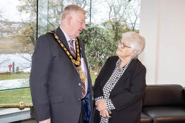 Mayor, Councillor Steven Callaghan congratulating Margaret Peacock on her charitable work. Credit McAuley Multimedia