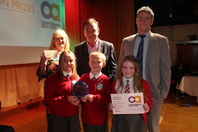 Fort Hill IPS pupils and teachers receiving their Carson Award from co-founder Tony Carson. Pic credit: Declan Roughan