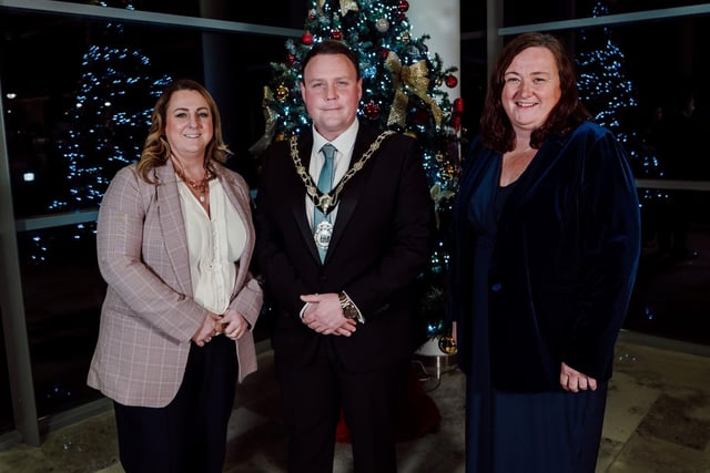 Lauren Doherty and Michelle Hull from Northern Ireland Children’s Hospice with the Mayor of Antrim and Newtownabbey, Councillor Mark Cooper.