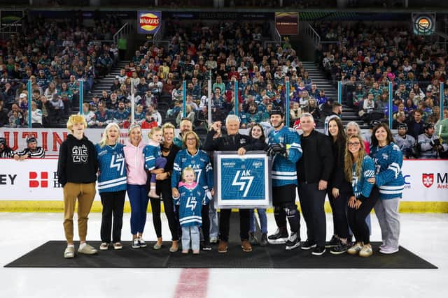 Close family and friends of Adam Keefe gather on the ice at The SSE Arena, Belfast with a custom framed Adam Keefe Testimonial jersey. Picture: Press Eye/Darren Kidd