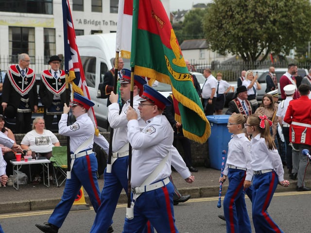 Taking part in the 'Last Saturday' parade.