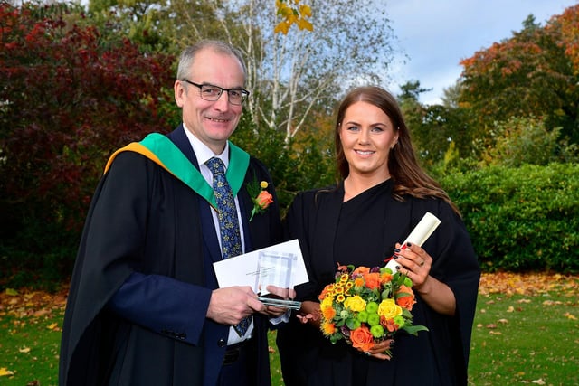 Lois Neely, Broughshane, who received the Department of Agriculture, Environment and Rural Affairs Prize in recognition of being the top Level 2 Technical Certificate in Floristry student, with Martin McKendry, CAFRE director.