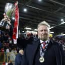 Portadown manager Niall Currie with the Playr-Fit Championship trophy.