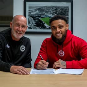 Gary Haveron welcomes Montel Gibson (right) as Larne's new signing. (Photo: Larne FC)