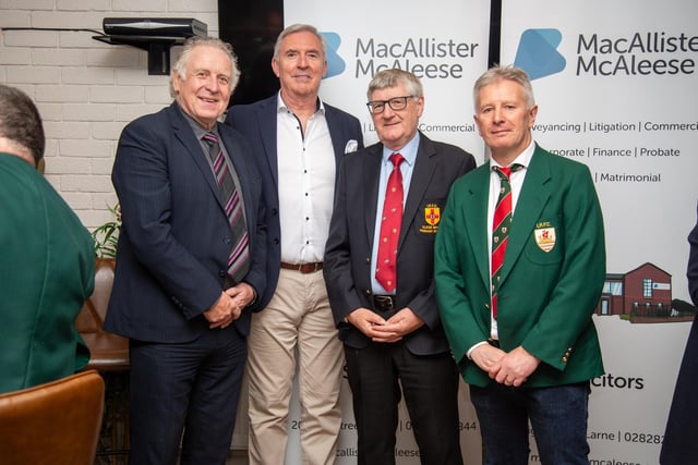 Guest speaker Gerry Armstrong (left) and guest of honour, IRFU president, Denis Gardiner (second from right), at Larne RFC's annual dinner.