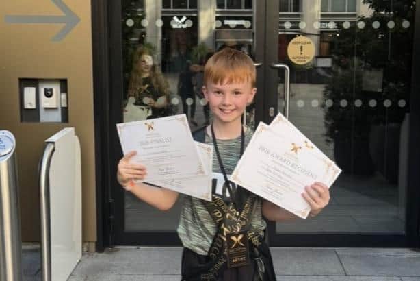 Joseph Mulholland, aged 10, from Lurgan, Co Armagh, who scooped several top prizes at the National Performance Awards in Belfast.