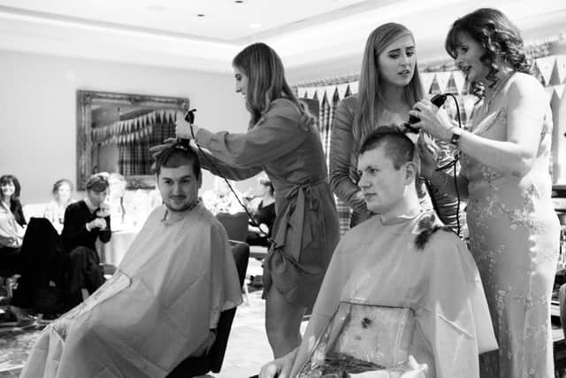 Joanne and her four children,  Andrea, Christopher, Kieran and Micheala, taking part in the head shave,