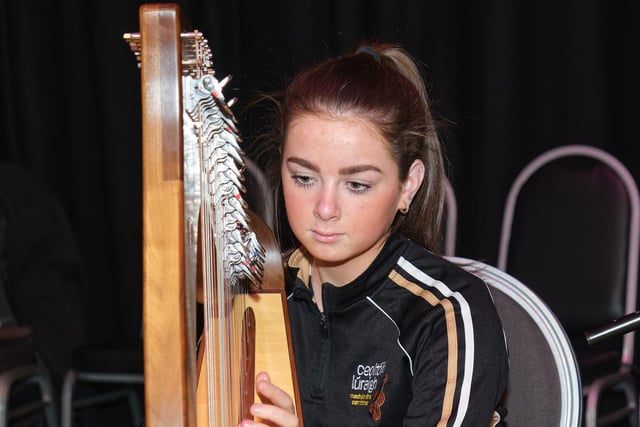 Playing the harp for the audience attending the Seisiún Mór charity event in Bellaghy.