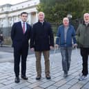 The family of Sean Farmer pictured outside the High Court in Belfast with Diarmuid Brecknell from Phoniex Law and Alan Brecknell from the Pat Finucane Centre. Picture: Jonathan Porter/PressEye
