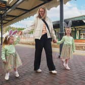 Abbie and Lacie pictured with their Mum at Antrim train station enjoying a family day out.
