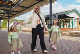 Abbie and Lacie pictured with their Mum at Antrim train station enjoying a family day out.