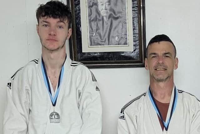 Charlie and Martin Fearon with Shenso medals.