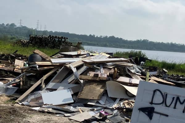 A local resident has expressed concern about the dumping of bonfire wood at Stoneyford reservoir. Pic credit: Contributed by Stoneyford resident