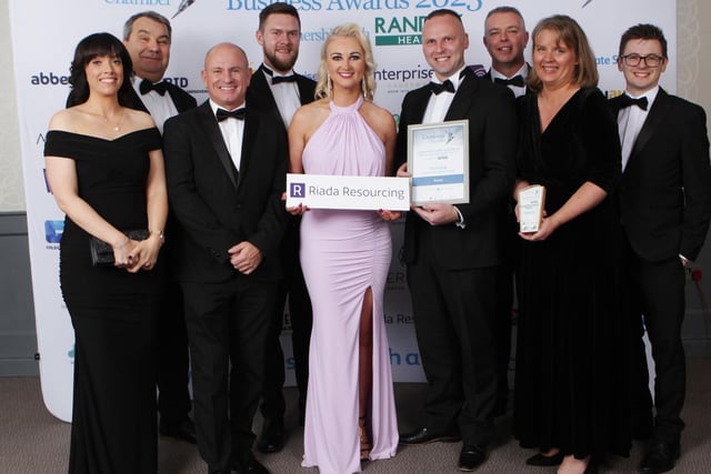 COMMUNITY IMPACT AWARD goes to Terex received by Mark McKay and Darryl McGall from Arlene McConaghie of sponsor RIADA RESOURCING at the Causeway Chamber of Commerce Awards 2023 in partnership with Randox Health held at the Lodge Hotel. 1