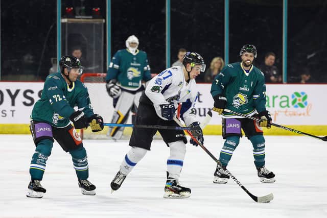 Belfast Giants All Stars’ Darryl Lloyd with Dnipro Kherson’s Artem Tselohorodtsev during Wednesday’s game at the SSE Arena, Belfast in support of Ukrainian Hockey Dream.   All of the proceeds from the game's ticket sales will be donated to the Ukrainian Hockey Dream in support of their continued work to reinstate ice hockey throughout Ukraine.    Photo by William Cherry/Presseye