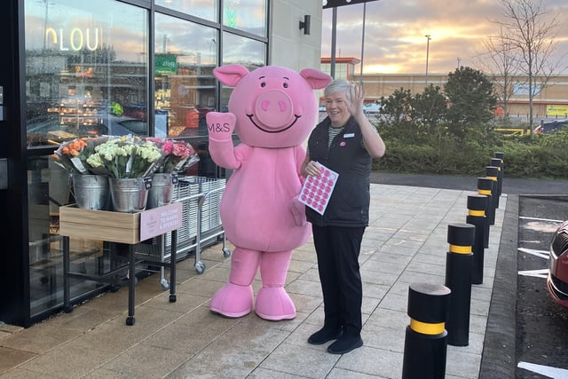 Percy the Pig and helper ready to greet the first shoppers to the M&S store in Coleraine.