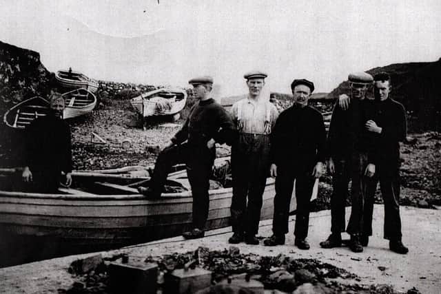 Fishermen at Dunseverick, including Sammy Gault and James Wilkinson. This photo was submitted to the Uncharted Histories project by Jim Wilkinson.