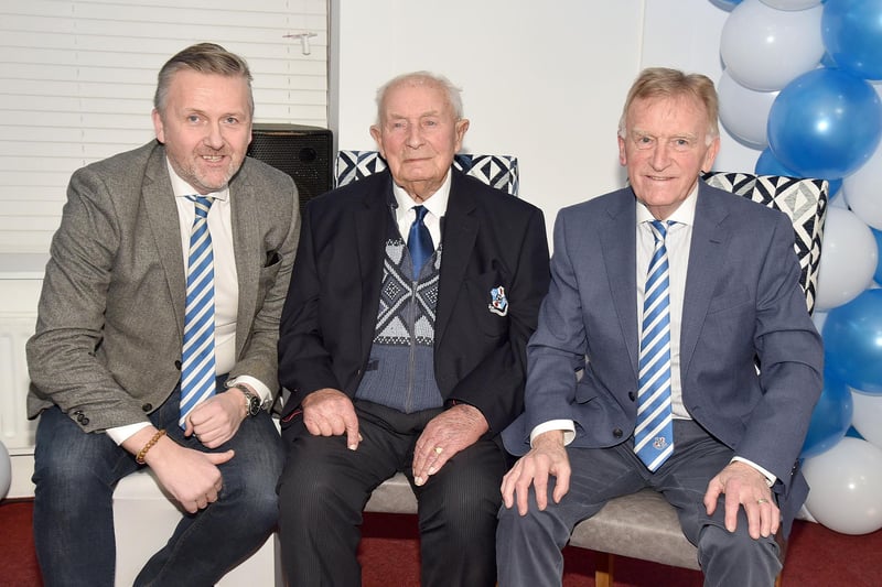 Hilbert Willis pictured at his 100th birthday party with Loughgall FC chairman, Councillor Sam Nicholson, left, and club president, Noel Willis. PT07-205.