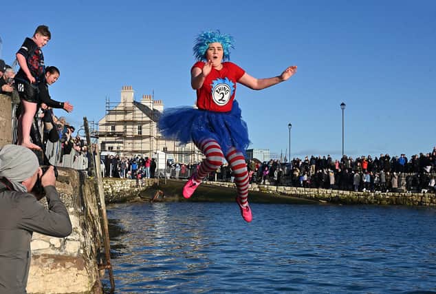 Making a splash for charity at the annual New Year's Day swim in Carnlough.