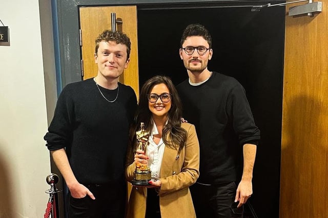 Assistant Manager of the Movie House Jet Centre Laura Dysart with Oscar winners Tom Berekley and Ross White